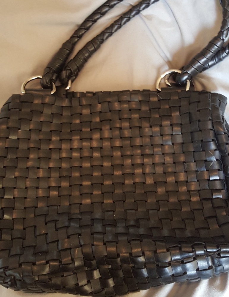 Supple leather, Black woven handbag.